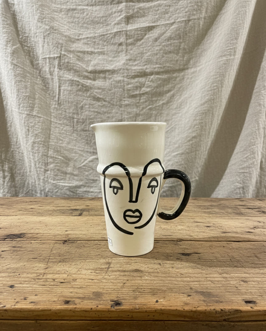 Mugge med ansikt
