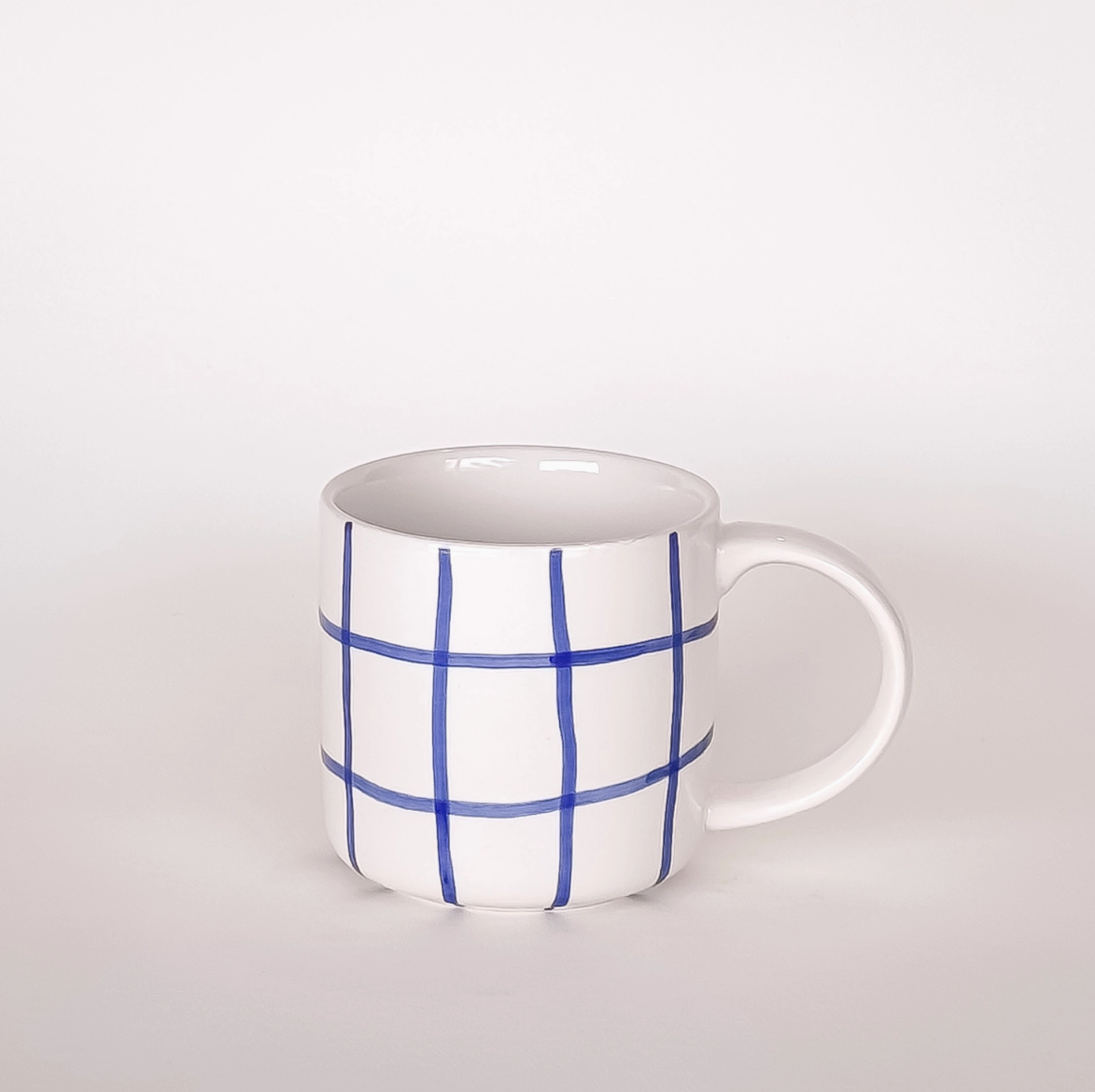 Krus med blå ruter
