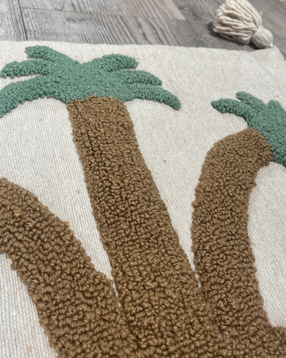 Beige putetrekk med palme motiv